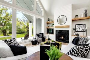 Photo of bright home interior with large geographic picture windows
